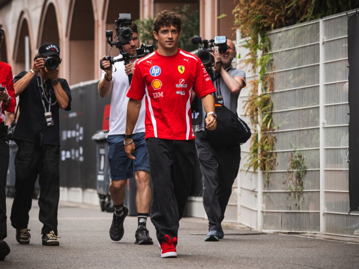 Ferrari's Monegasque driver Charles Leclerc walks down the paddock at the Circuit de Monaco in Monaco, on June 4, 2026, ahead of the Formula One Monaco Grand Prix. (Photo by Andrej ISAKOVIC / AFP)